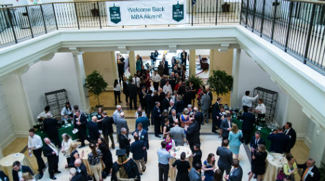 Alumni across five decades connect and converse in Miller Hall atrium.