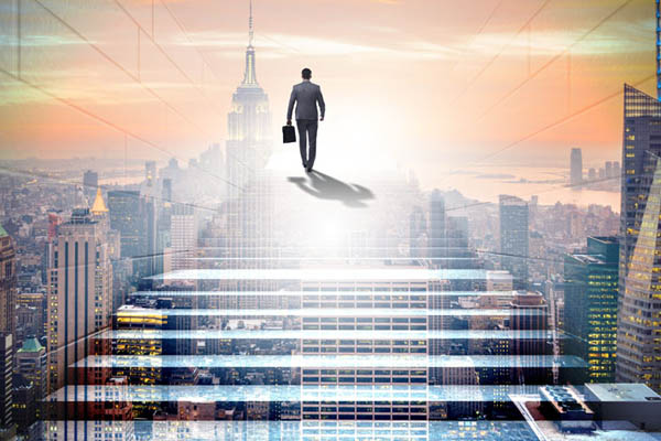 Businessman climbing translucent stairs over city