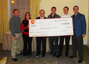 Tim Yewcic MBA '12, at far left, is pictured with his team.