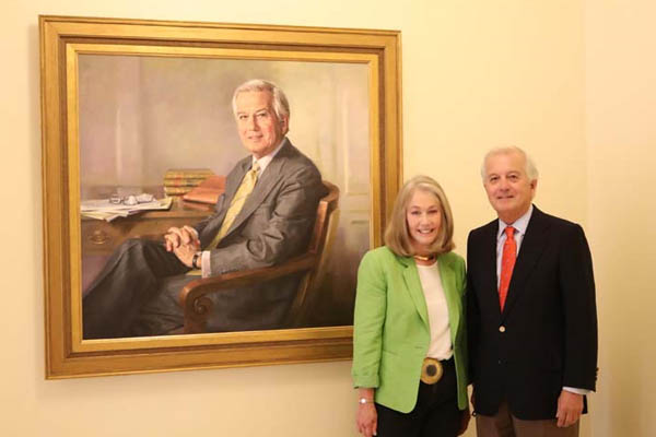 Ed Tokar and wife with painting