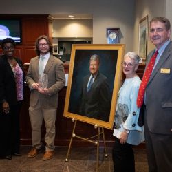 Alexis Swann, Regional President of TowneBank, Jack Rizzo'25, Betsy Calvo Anderson, and Mason School of Business Dean Todd Mooradian.