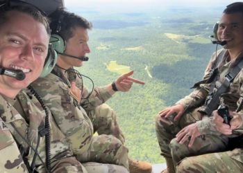 Spencer Anderson, Peter Lees, and Gregory Hacker in flight. 