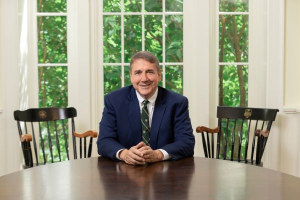 Image of Dean Todd Mooradian sitting at table