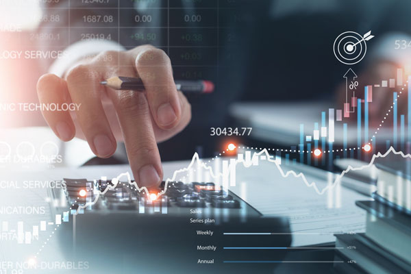 Finance analyst analyzing financial report and economic growth graph chart